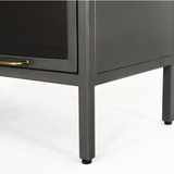 Featuring Aviva Barrister Cabinet by Four Hands at Amethyst Home. Inspired by the stackable barrister-style shelving, iron casing is finished in a gunmetal for a fresh industrial look, with smoked glass panes with flat brass hardware cover door fronts, each lifting to spacious compartments for storage of books and treasures.
Overall Dimensions: 32"W x 15"L x.  Amethyst Home provides interior design, new home construction design consulting, vintage area rugs, and lighting in the Seattle metro area.