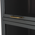 Featuring Aviva Barrister Cabinet by Four Hands at Amethyst Home. Inspired by the stackable barrister-style shelving, iron casing is finished in a gunmetal for a fresh industrial look, with smoked glass panes with flat brass hardware cover door fronts, each lifting to spacious compartments for storage of books and treasures.
Overall Dimensions: 32"W x 1.  Amethyst Home provides interior design, new home construction design consulting, vintage area rugs, and lighting in the Laguna Beach metro area.