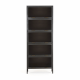Inspired by the stackable barrister-style shelving, iron casing is finished in a gunmetal for a fresh industrial look, with smoked glass panes with flat brass hardware cover door fronts, each lifting to spacious compartments for storage of books and treasures.  Overall Dimensions: 32.00"w x 15.00"d x 82.00"h  Colors: Smoked Glass, Flat Brass, Gunmetal Materials: Glass, Iron