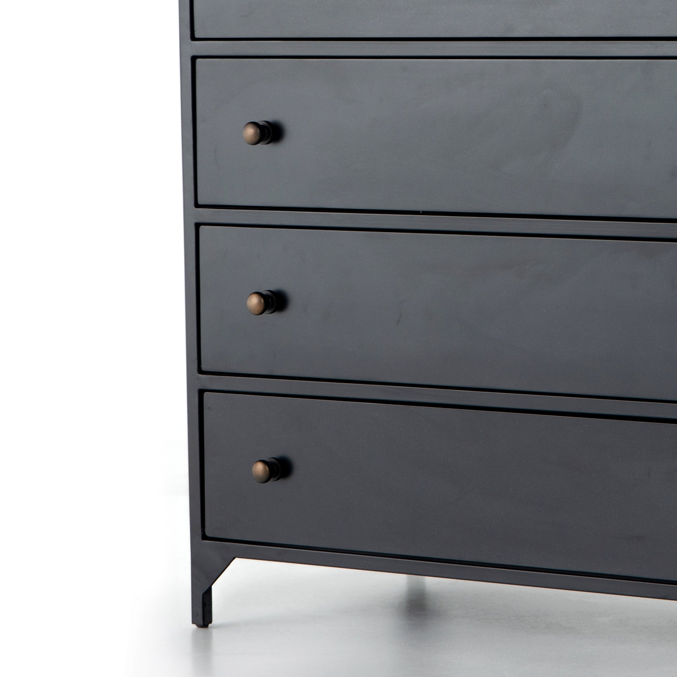 Sleek and industrial-inspired, this Belmont 8 Drawer Tall Dresser has black iron that forms a tall, spacious eight-drawers dresser. The brass knobs bring a cool contrast to any bedroom.   Overall Dimensions: 35.50"w x 19.75"d x 48.00"h  Colors: Black Materials: Iron