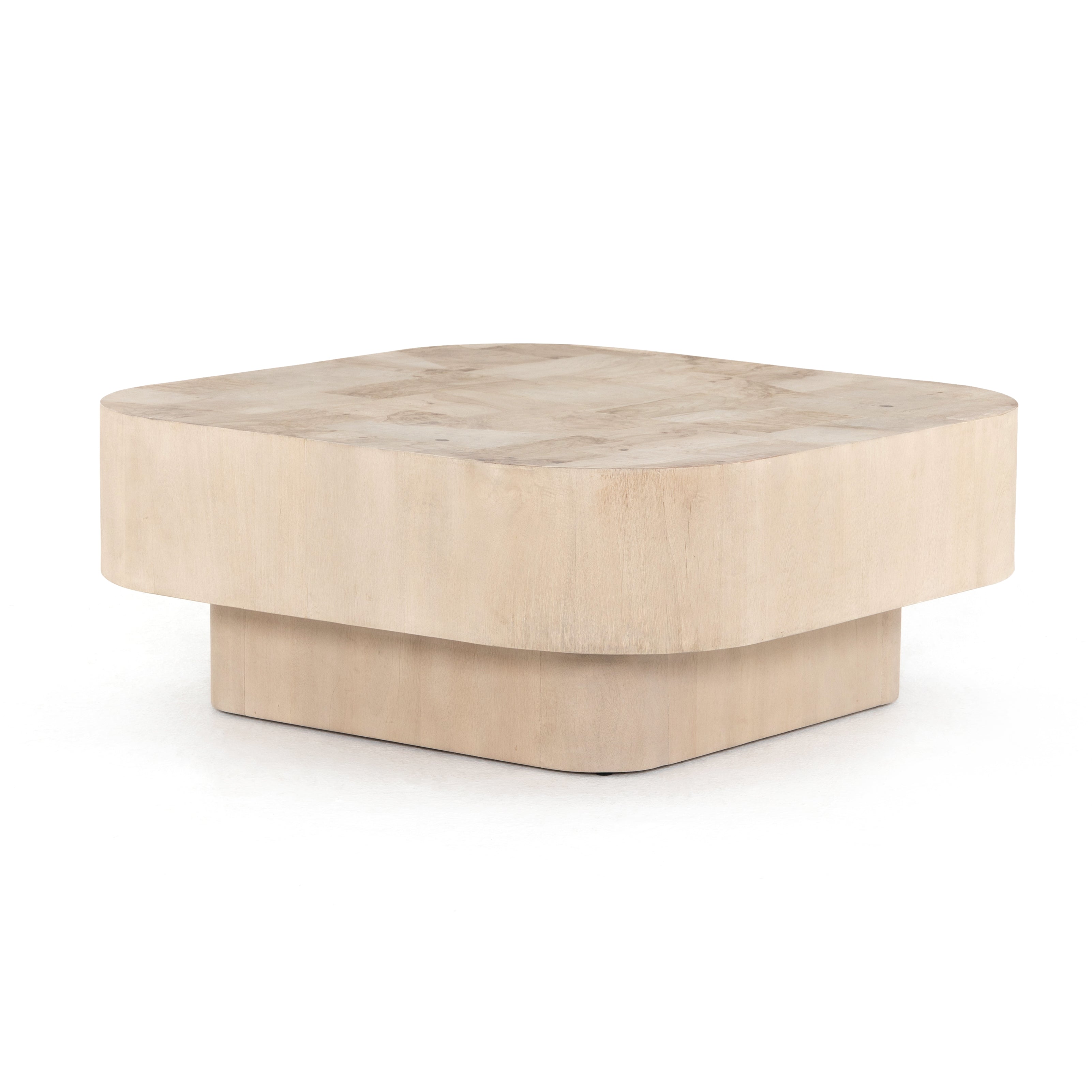 Made from bleached ash burl, this Blanco Coffee Table - Bleached Burl is a soft-squared tabletop featuring a patchwork pattern to bring novel movement to the modern coffee table. Finished in an ashen walnut, mahogany veneer sides and an inset base complete a beautifully light look for any living room or lounge area.   Overall Dimensions: 40.00"w x 40.00"d x 16.00"h