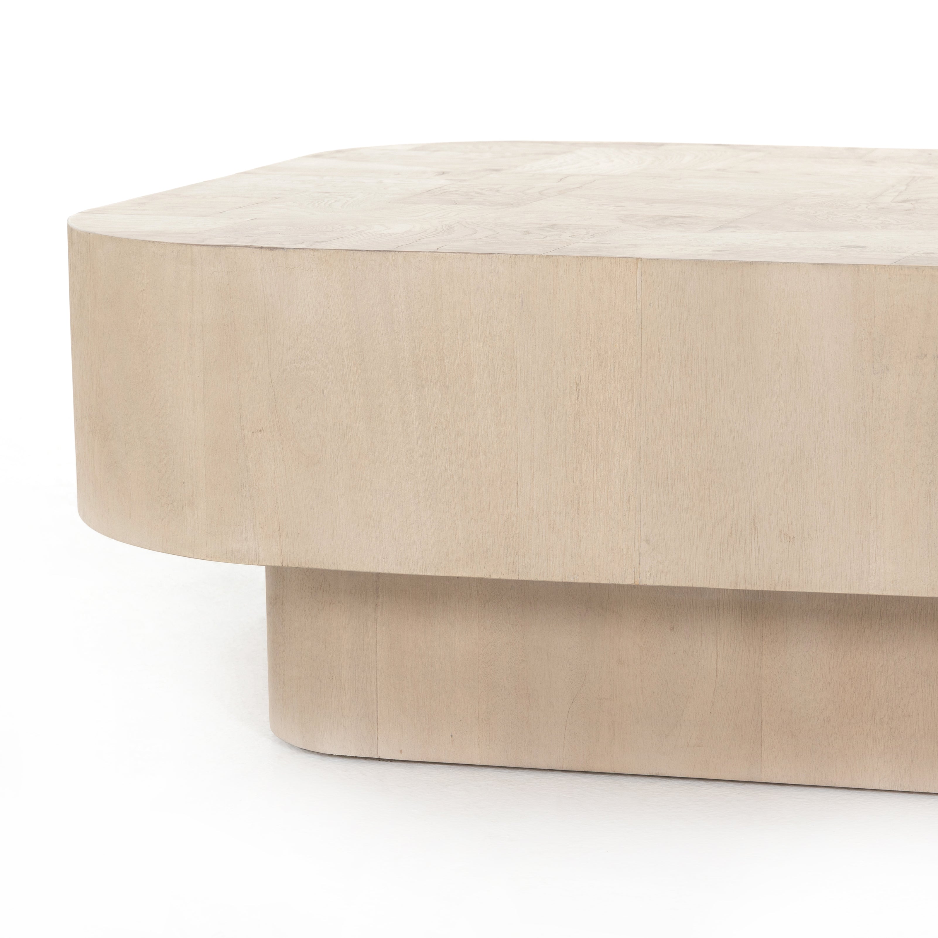 Made from bleached ash burl, this Blanco Coffee Table - Bleached Burl is a soft-squared tabletop featuring a patchwork pattern to bring novel movement to the modern coffee table. Finished in an ashen walnut, mahogany veneer sides and an inset base complete a beautifully light look for any living room or lounge area.   Overall Dimensions: 40.00"w x 40.00"d x 16.00"h
