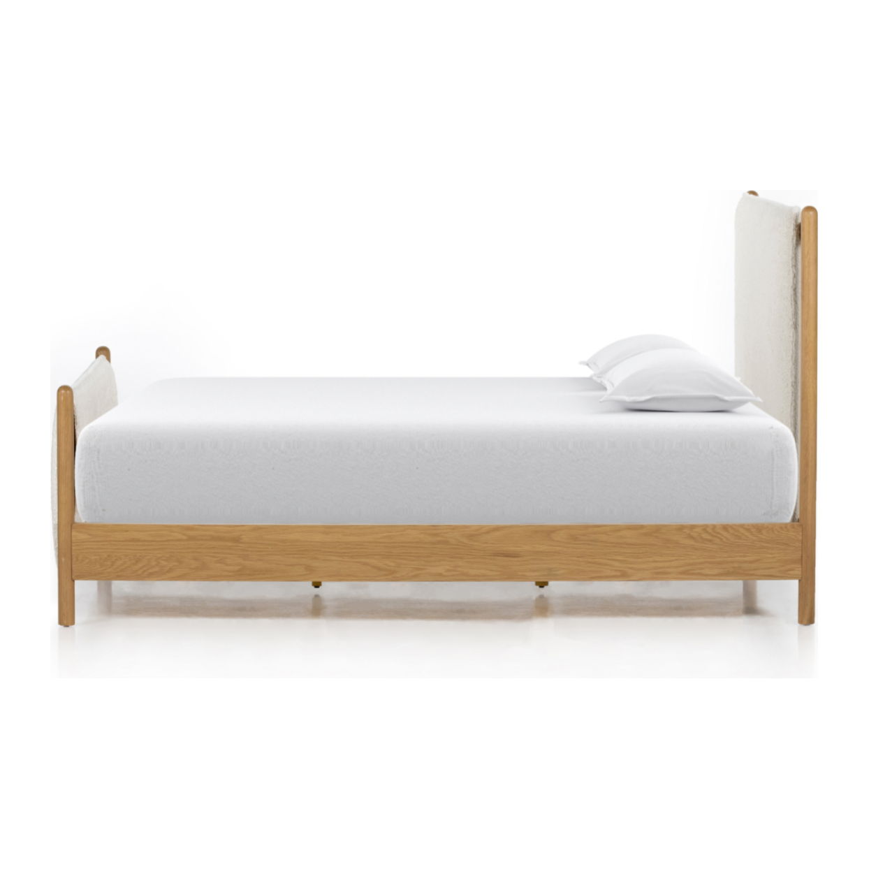 Bring a cozy hygge vibe to the bedroom with this textured Bowen Bed. Framed by light-finished solid oak, a sling-style bed features faux shearling head and foot boards -- sure to elevate any bedroom.   Queen Overall Dimensions: 64.25"w x 87.25"d x 48.00"h King Overall Dimensions: 80.25"w x 88.50"d x 48.00"h