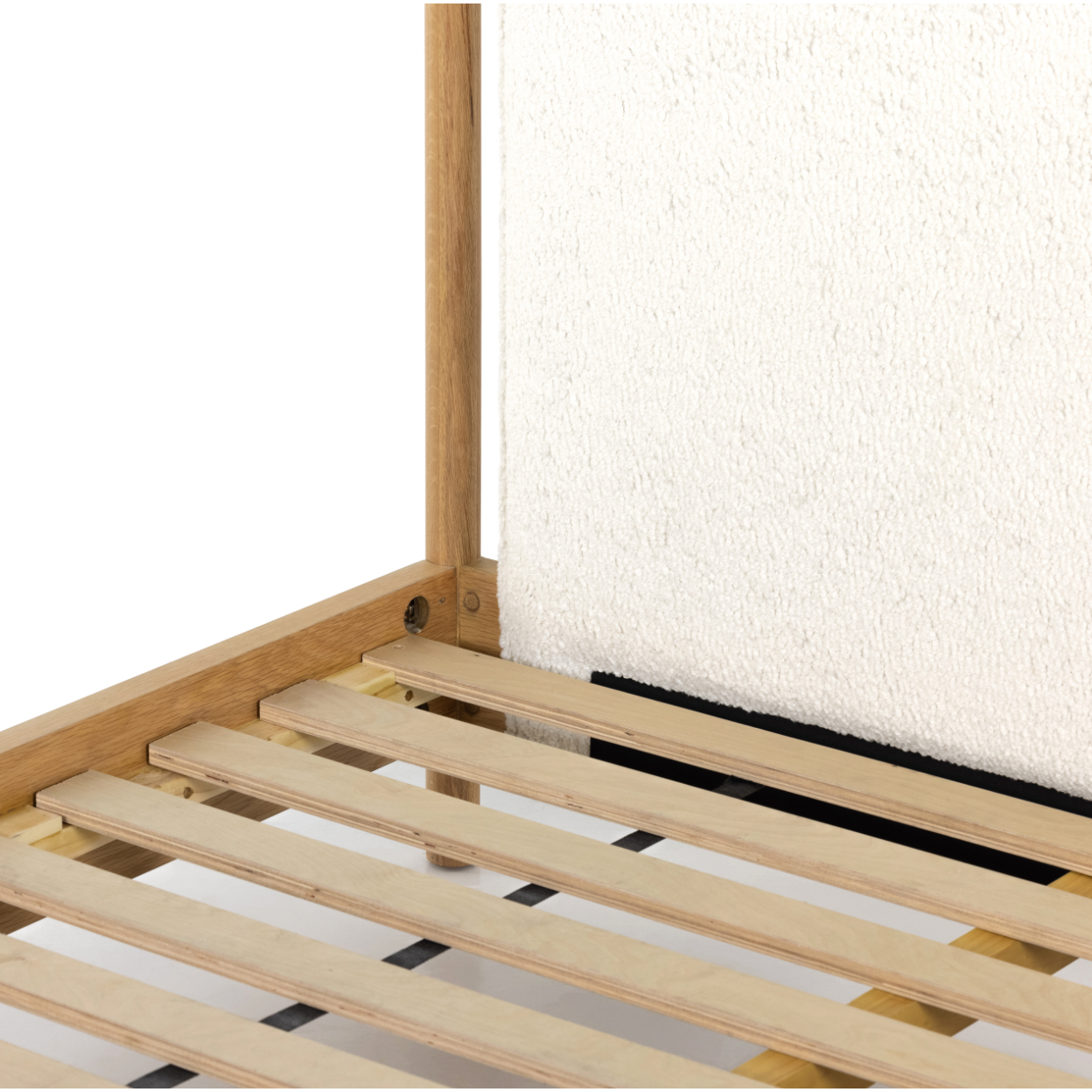 Bring a cozy hygge vibe to the bedroom with this textured Bowen Bed. Framed by light-finished solid oak, a sling-style bed features faux shearling head and foot boards -- sure to elevate any bedroom.   Queen Overall Dimensions: 64.25"w x 87.25"d x 48.00"h King Overall Dimensions: 80.25"w x 88.50"d x 48.00"h