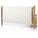 Bring a cozy hygge vibe to the bedroom with this textured Bowen Bed. Framed by light-finished solid oak, a sling-style bed features faux shearling head and foot boards -- sure to elevate any bedroom.   Queen Overall Dimensions: 64.25"w x 87.25"d x 48.00"h King Overall Dimensions: 80.25"w x 88.50"d x 48.00"h