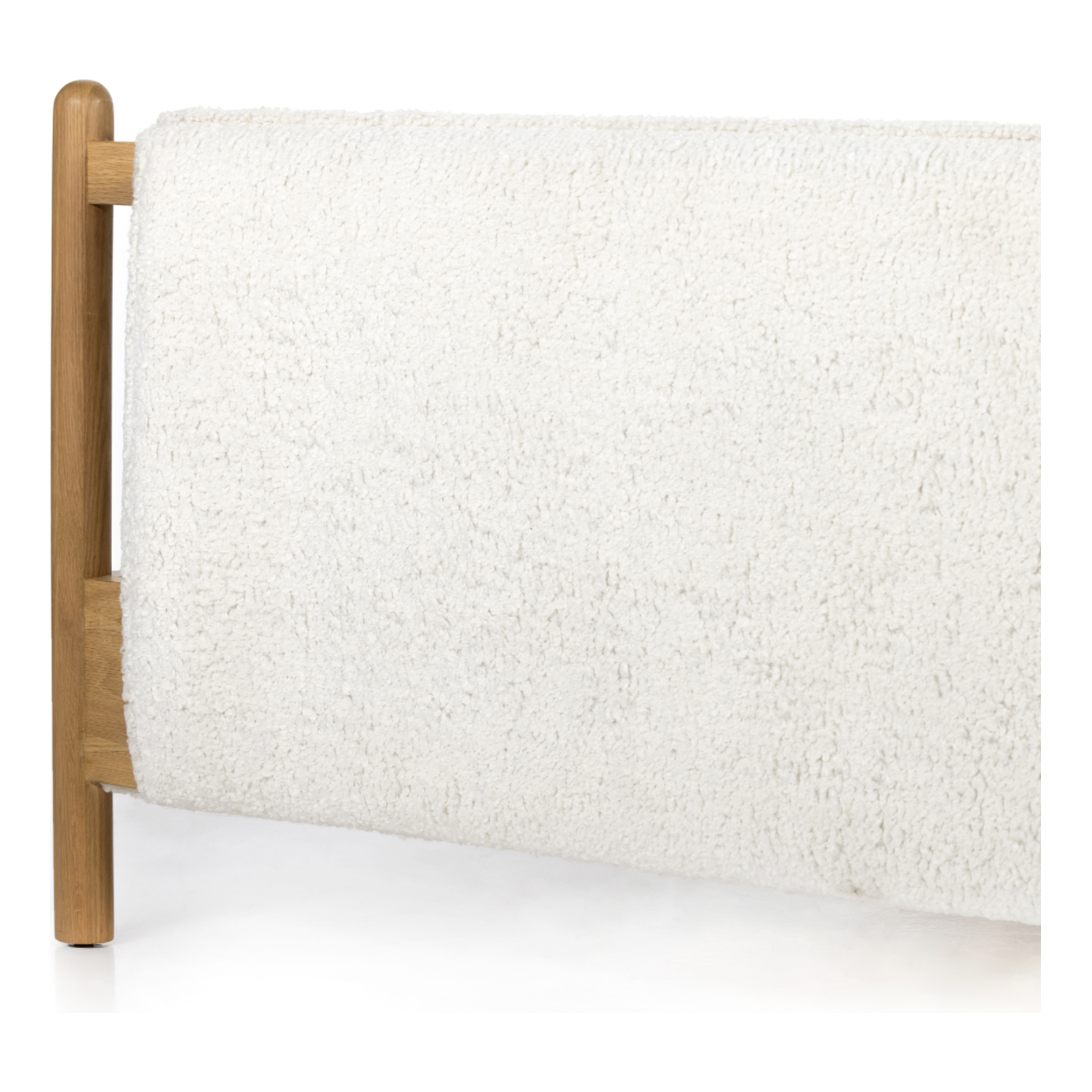 Bring a cozy hygge vibe to the bedroom with this textured Bowen Bed. Framed by light-finished solid oak, a sling-style bed features faux shearling head and foot boards -- sure to elevate any bedroom.   Queen Overall Dimensions: 64.25"w x 87.25"d x 48.00"h King Overall Dimensions: 80.25"w x 88.50"d x 48.00"h