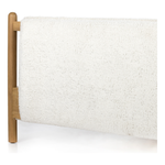 Bring a cozy hygge vibe to the bedroom with this textured Bowen Bed. Framed by light-finished solid oak, a sling-style bed features faux shearling head and foot boards -- sure to elevate any bedroom.   Queen Overall Dimensions: 64.25"w x 87.25"d x 48.00"h King Overall Dimensions: 80.25"w x 88.50"d x 48.00"h