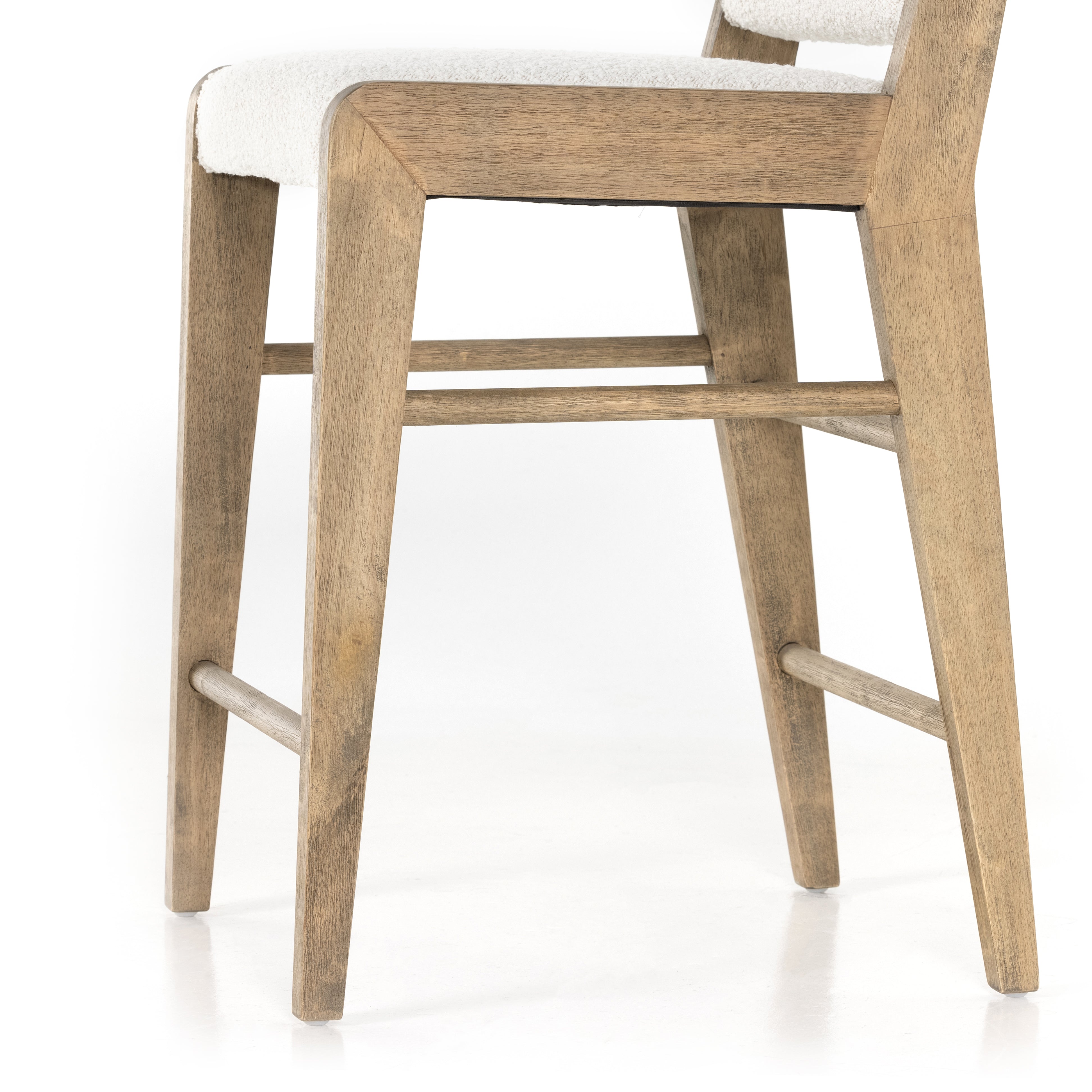 Featuring Charon Counter Stool by Four Hands at Amethyst Home. We love the mixed materials found in this Charon Bar + Counter Stool. In a light, natural finish, solid parawood forms an angular frame for boucle-upholstered seating in a classic cream.
Counter Stool Overall Dimensions: 19.75"W x 21.50"L x 35.50"HSeat Depth: 17.0"Seat Height: 26.25"
Colors: K.  Amethyst Home provides interior design, new home construction design consulting, vintage area rugs, and lighting in the Washington metro area.