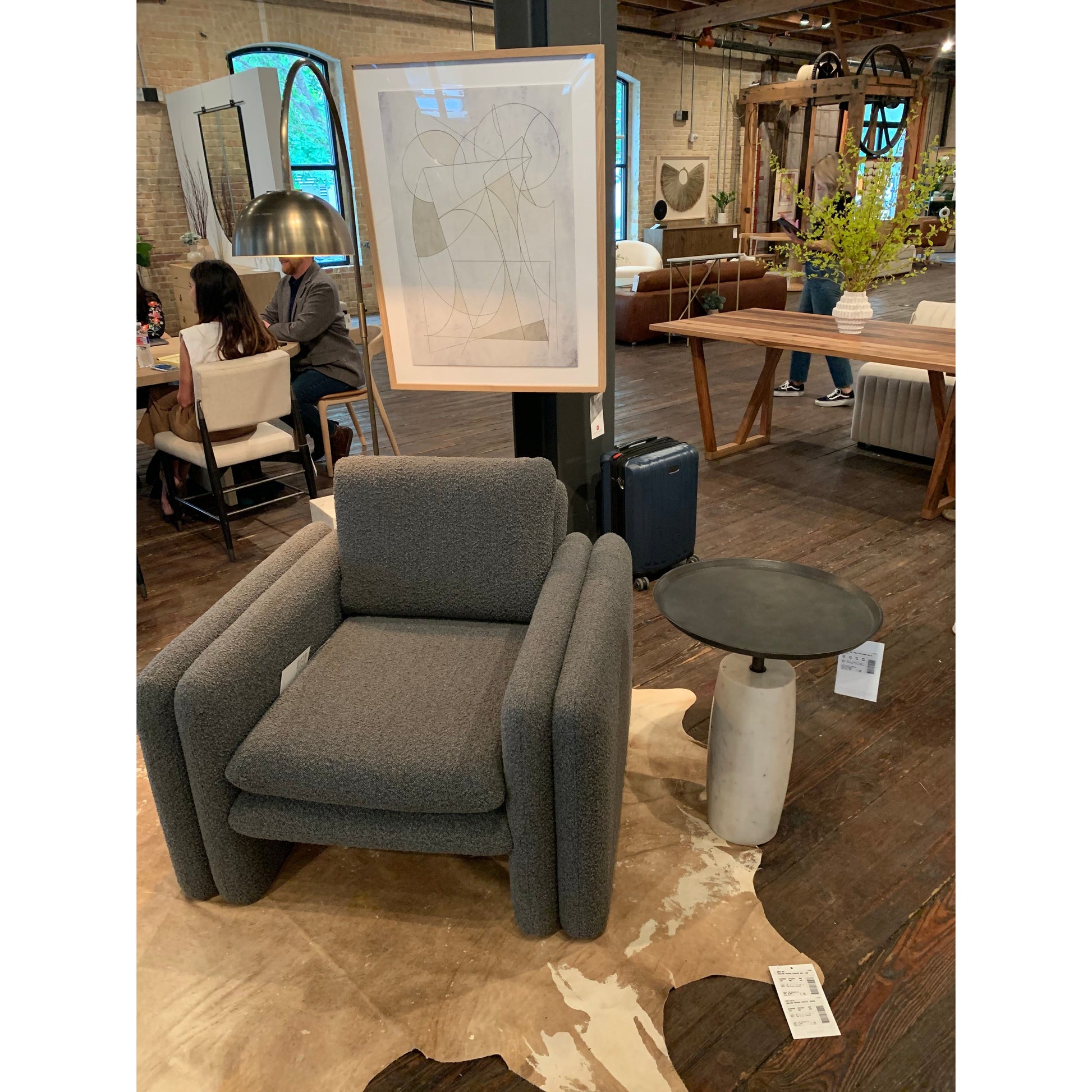 Simply sophisticated with this Cronos End Table - Polished White Marble. Finished in a polished white, a solid turned marble base supports a tray-style tabletop of grey-hammered iron, spurring beautifully eye-catching contrast for any living room or bedroom.   Overall Dimensions: 19.75"w x 19.75"d x 24.75"h