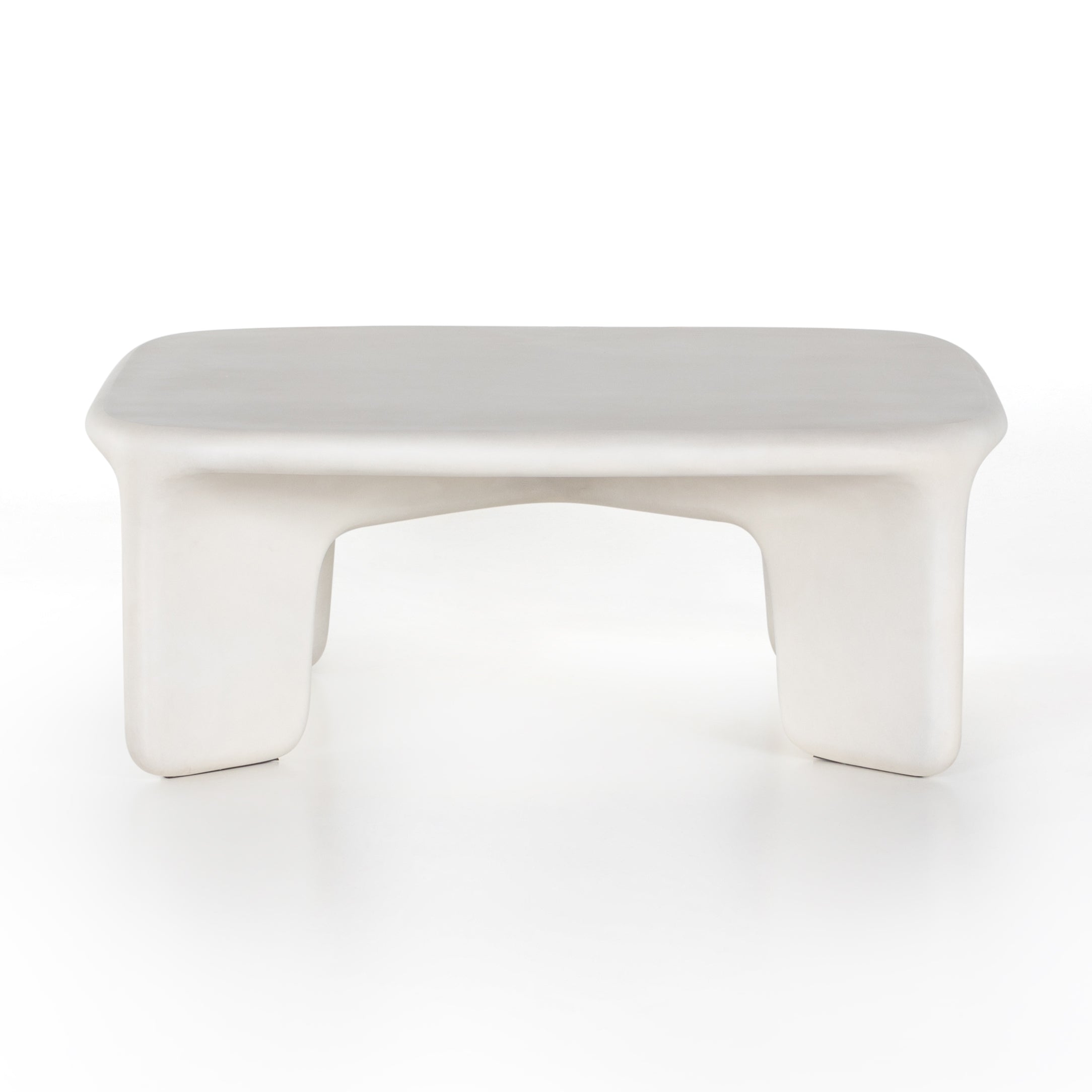 A minimalist dream, this Dante Coffee Table - White Concrete is made from white-finished cast concrete with soft, chunky proportions. This would elevate the space for any living room or lounge area.    Overall Dimensions: 42.00"w x 42.00"d x 16.00"h