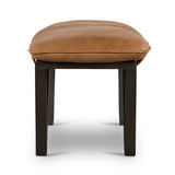 Featuring Darrow Bench -  Palermo Cognac by Four Hands at Amethyst Home. The Darrow Bench -  Palermo Cognac is a time-honored bench, reinvented. With fresh, clever shaping, angular gunmetal-finished iron supports spare-yet-comfortable top-grain leather cushioning in a rich cognac.
Overall Dimensions: 63.50"W x 17.50"L x 17.75"H
Colors: Light Gunmetal, Pa.  Amethyst Home provides interior design, new home construction design consulting, vintage area rugs, and lighting in the Kansas City metro area.
