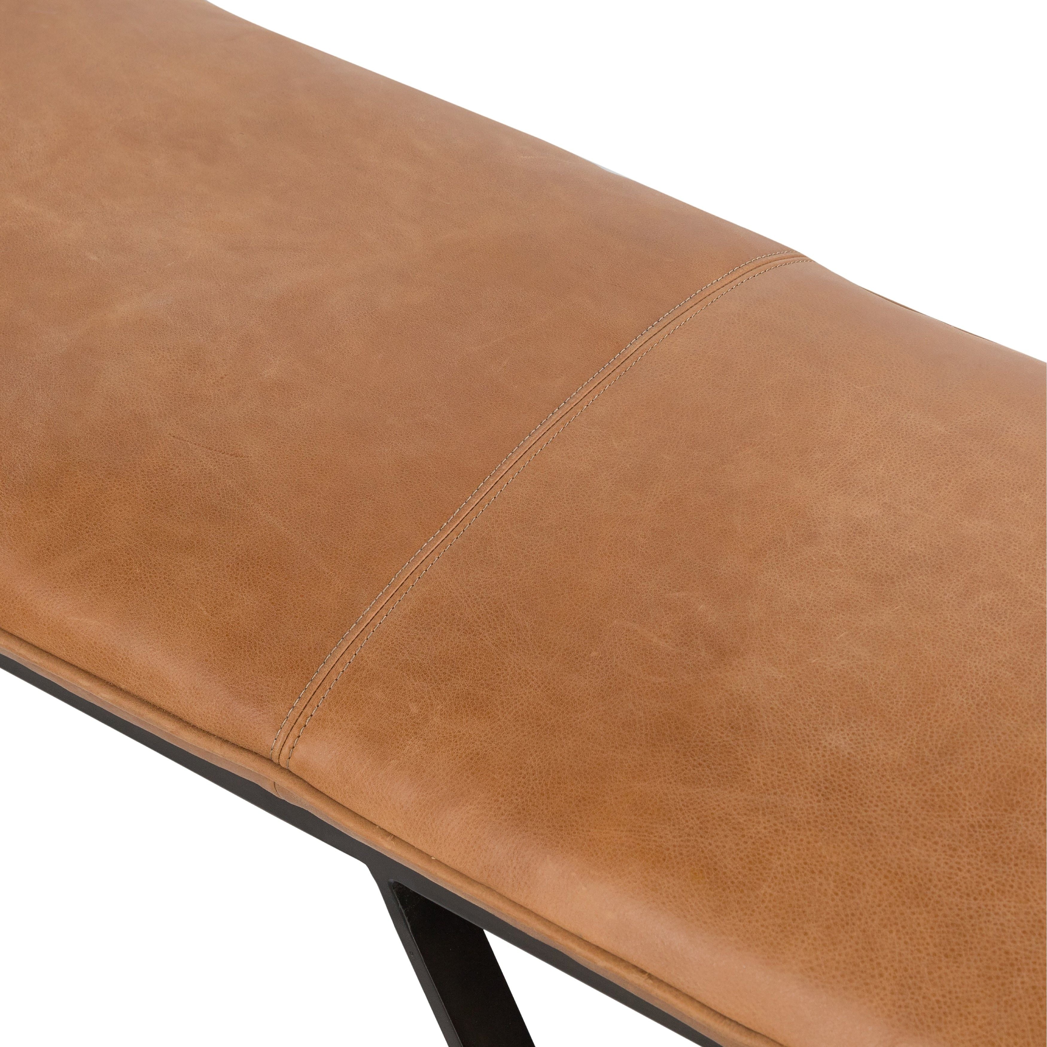 Featuring Darrow Bench -  Palermo Cognac by Four Hands at Amethyst Home. The Darrow Bench -  Palermo Cognac is a time-honored bench, reinvented. With fresh, clever shaping, angular gunmetal-finished iron supports spare-yet-comfortable top-grain leather cushioning in a rich cognac.
Overall Dimensions: 63.50"W x 17.50"L x 17.75"H
Colors: Light Gunmetal, Palermo .  Amethyst Home provides interior design, new home construction design consulting, vintage area rugs, and lighting in the Omaha metro area.