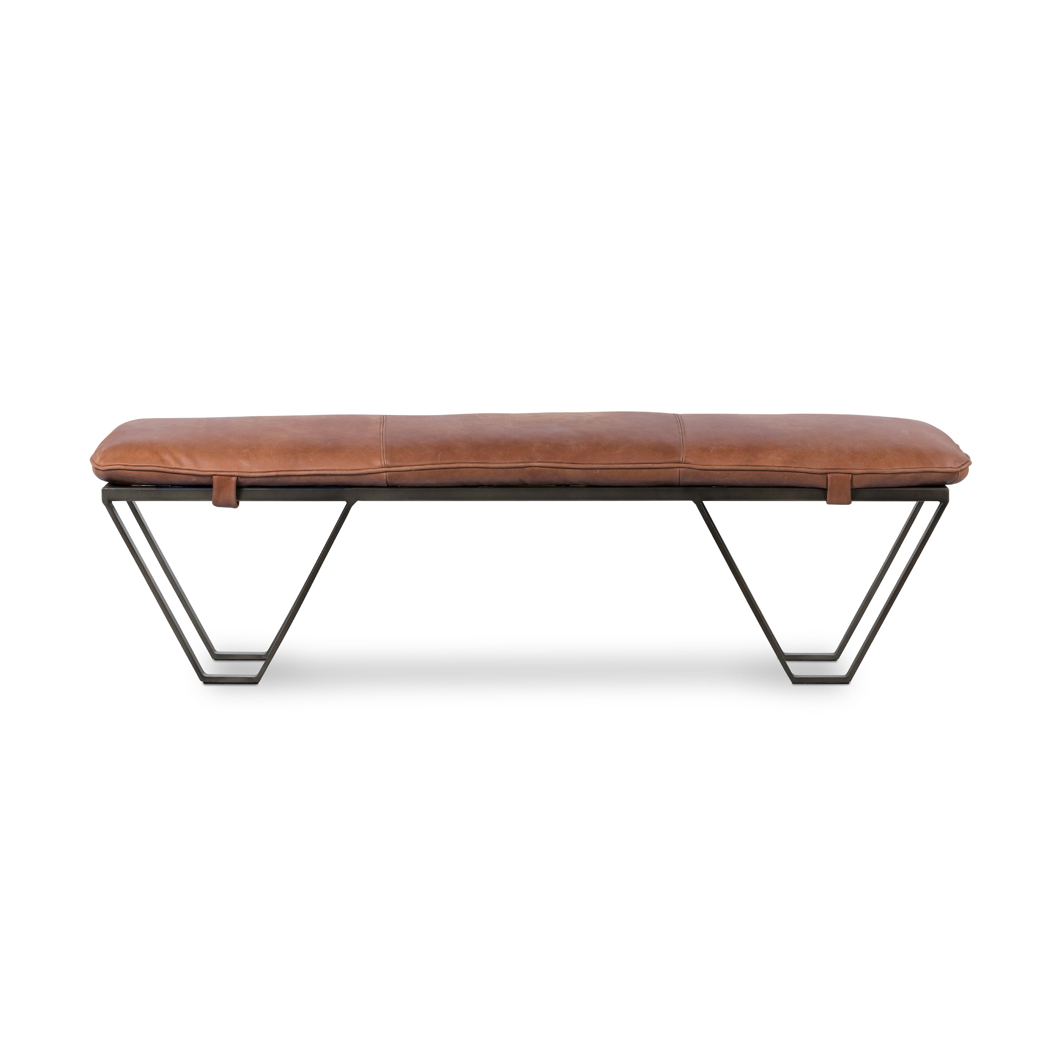 Featuring Darrow Bench -  Palermo Cognac by Four Hands at Amethyst Home. The Darrow Bench -  Palermo Cognac is a time-honored bench, reinvented. With fresh, clever shaping, angular gunmetal-finished iron supports spare-yet-comfortable top-grain leather cushioning in a rich cognac.
Overall Dimensions: 63.50"W x 17.50"L x 17.75"H
Colors: Light Gunmetal, Palermo .  Amethyst Home provides interior design, new home construction design consulting, vintage area rugs, and lighting in the Miami metro area.