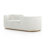 Modern European inspiration and plush curves come head to head in this stylish Deandra Tete a Tete Chaise - Merino Cotton. Upholstered in a soft liquid-repellent performance fabric that feels both casual and elevated, this is the perfect choice for families with kids or pets!  Overall Dimensions: 90.50"w x 38.00"d x 29.00"h