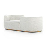 Modern European inspiration and plush curves come head to head in this stylish Deandra Tete a Tete Chaise - Merino Cotton. Upholstered in a soft liquid-repellent performance fabric that feels both casual and elevated, this is the perfect choice for families with kids or pets!  Overall Dimensions: 90.50"w x 38.00"d x 29.00"h