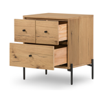 Featuring Eaton Light Oak Resin Nightstand by Four Hands at Amethyst Home. This Eaton Nightstand - Light Oak has a gorgeous, thick oak veneer with thin, iron legs. With one large drawer and two smaller drawers, this is the perfect nightstand to complete your bedroom. 
Overall Dimensions: 23.50"W x 18.50"L x 26"HColors: Dark Gunmetal, Light Oak ResinMateria.  Amethyst Home provides interior design, new home construction design consulting, vintage area rugs, and lighting in the San Diego metro area.