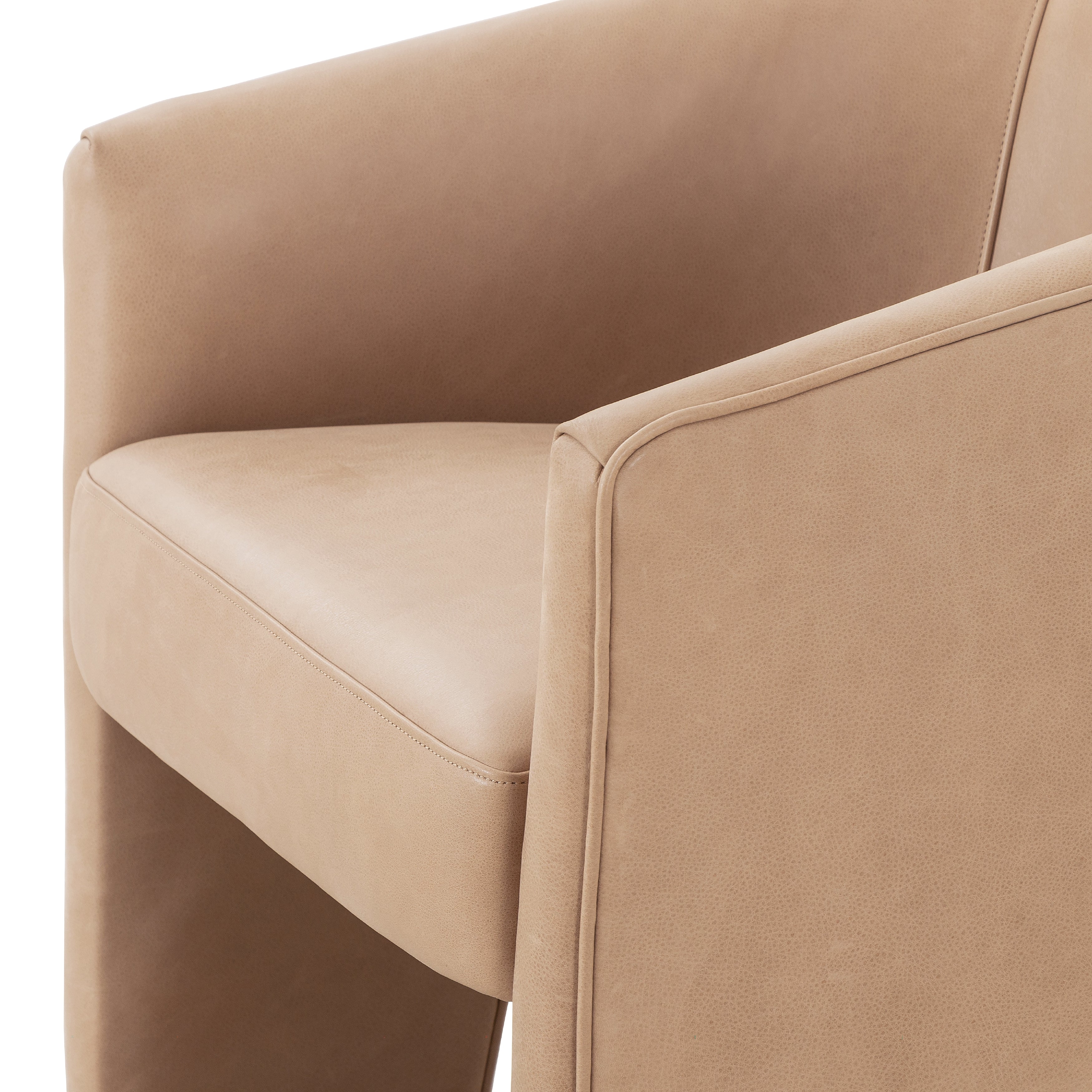 This Fae Chair - Pallermo Nude is well-tailored and stylistically unique. The top grain leather lends a high-fashion feel to a cleverly constructed three-legged design.  Overall Dimensions: 30.25"w x 29.50"d x 29.50"h