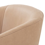This Fae Chair - Pallermo Nude is well-tailored and stylistically unique. The top grain leather lends a high-fashion feel to a cleverly constructed three-legged design.  Overall Dimensions: 30.25"w x 29.50"d x 29.50"h