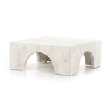We love how clean and simple this Fausto Coffee Table -  Bleached Guanacaste is. Made from beautiful bleached Guanacaste, shapely arches and block corners speak to the architectural inspiration behind this eye-catching coffee table.  Overall Dimensions: 40.00"w x 40.00"d x 16.00"h