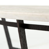 We love the textured top and geometric base of this Felix Round Coffee Table - Sandblasted White Marble. Place in your living room or lounge area to bring a sophisticated look to the space.  Overall Dimensions: 48.00"w x 48.00"d x 15.00"h Colors: Rustic Fossil, Sandblasted White Marble Materials: Iron, Marble Weight: 189.6 lb