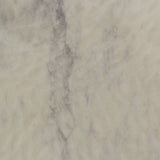 We love the textured top and geometric base of this Felix Round Coffee Table - Sandblasted White Marble. Place in your living room or lounge area to bring a sophisticated look to the space.  Overall Dimensions: 48.00"w x 48.00"d x 15.00"h Colors: Rustic Fossil, Sandblasted White Marble Materials: Iron, Marble Weight: 189.6 lb
