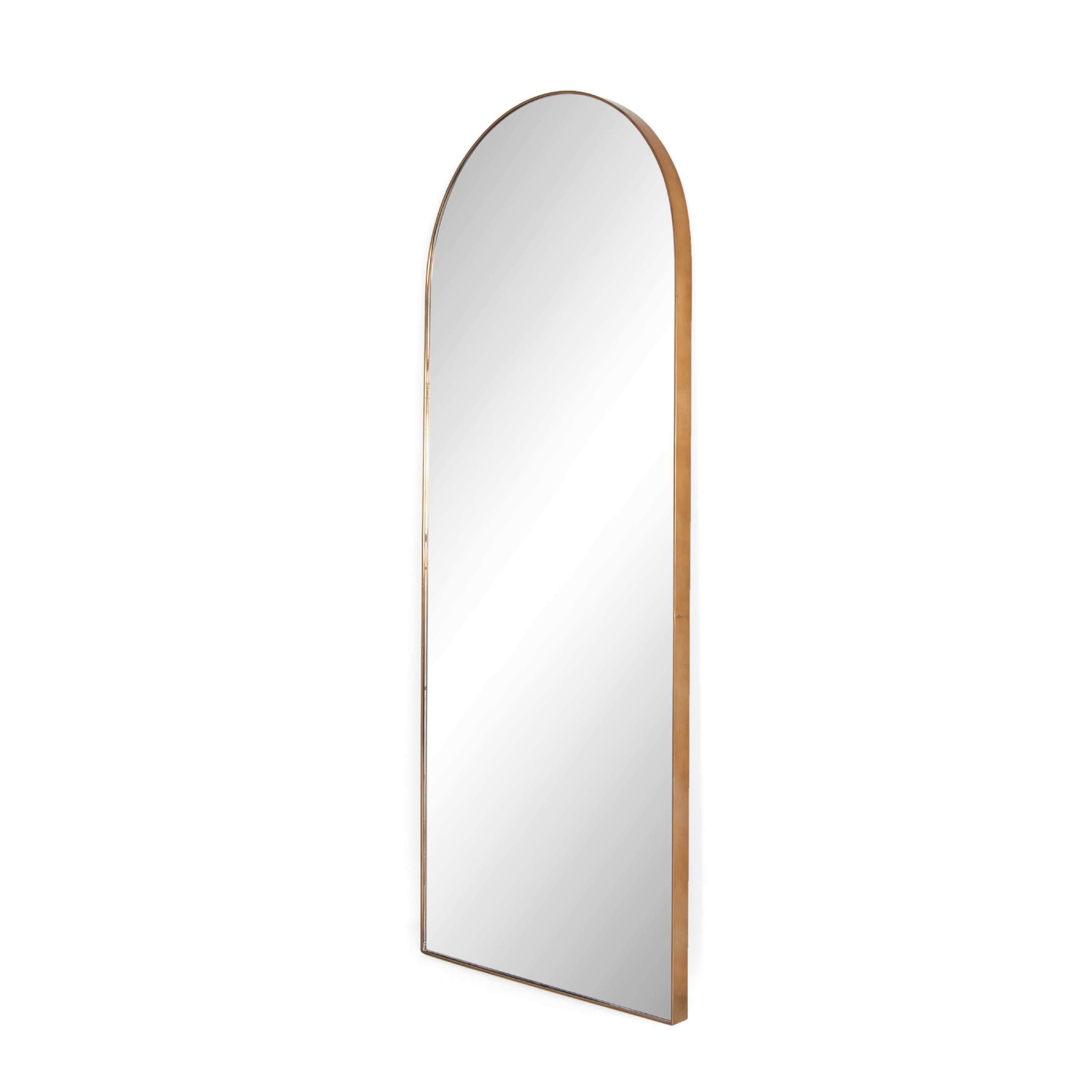 This Georgina Floor Mirror has a beautiful arch with a rose gold-finish aluminum frame. This will be the go-to mirror at home to try on your newest shopping haul or take that shameless selfie in.  Overall Dimensions: 32.00"w x 2.00"d x 80.00"h Colors: Polished Brass, Mirror Materials: Aluminum, Mirror Weight: 110  Please allow 3-4 weeks on shipment for these items. 