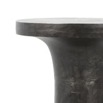 Made from raw black cast aluminum, a dramatically tapered Gino End Table - Raw Black flaunts beautiful high/ low hues and subtle Brutalist vibes. Perfect for setting your book or favorite drink next to.   Overall Dimensions: 13.00"w x 13.00"d x 20.00"h