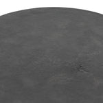 Made from raw black cast aluminum, a dramatically tapered Gino End Table - Raw Black flaunts beautiful high/ low hues and subtle Brutalist vibes. Perfect for setting your book or favorite drink next to.   Overall Dimensions: 13.00"w x 13.00"d x 20.00"h