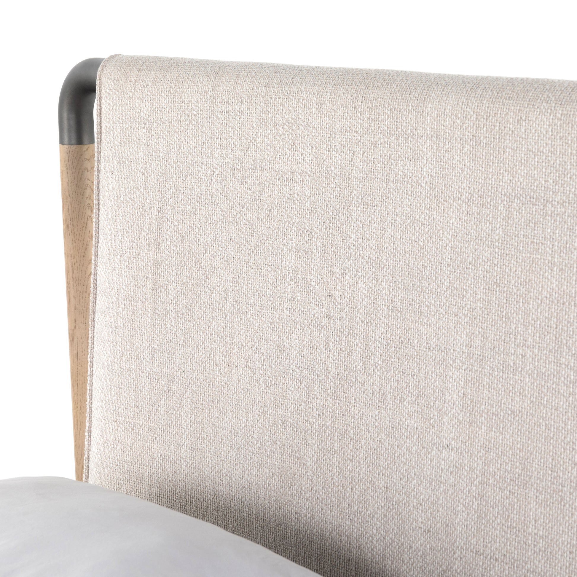 We love the mixed materials of this Harriet Bed. Framed by solid oak with rounded iron corners, an upholstered, sling-style headboard brings a light, modern vibe to any bedroom. Queen Overall Dimensions: 70.50"w x 88.50"d x 51.00"h  King Overall Dimensions: 86.50"w x 88.50"d x 51.00"h