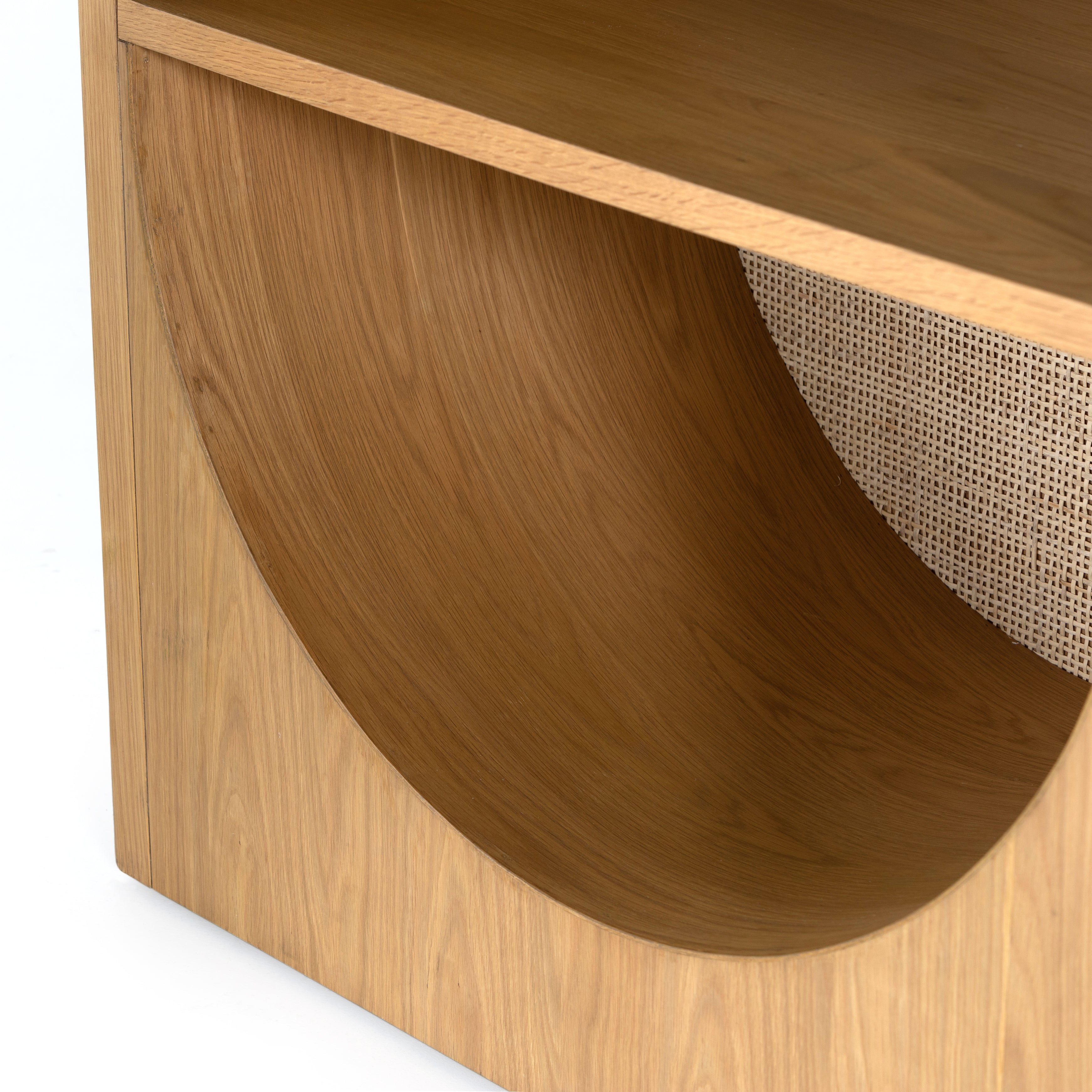 We are obsessed with the natural cane paneling on this Higgs Bookcase - Honey Oak Veneer. The tall, clean frame has four shelves perfect for showcasing your favorite books, family photos, or family heirlooms   Overall Dimensions: 34.75"w x 18.00"d x 84.00"h
