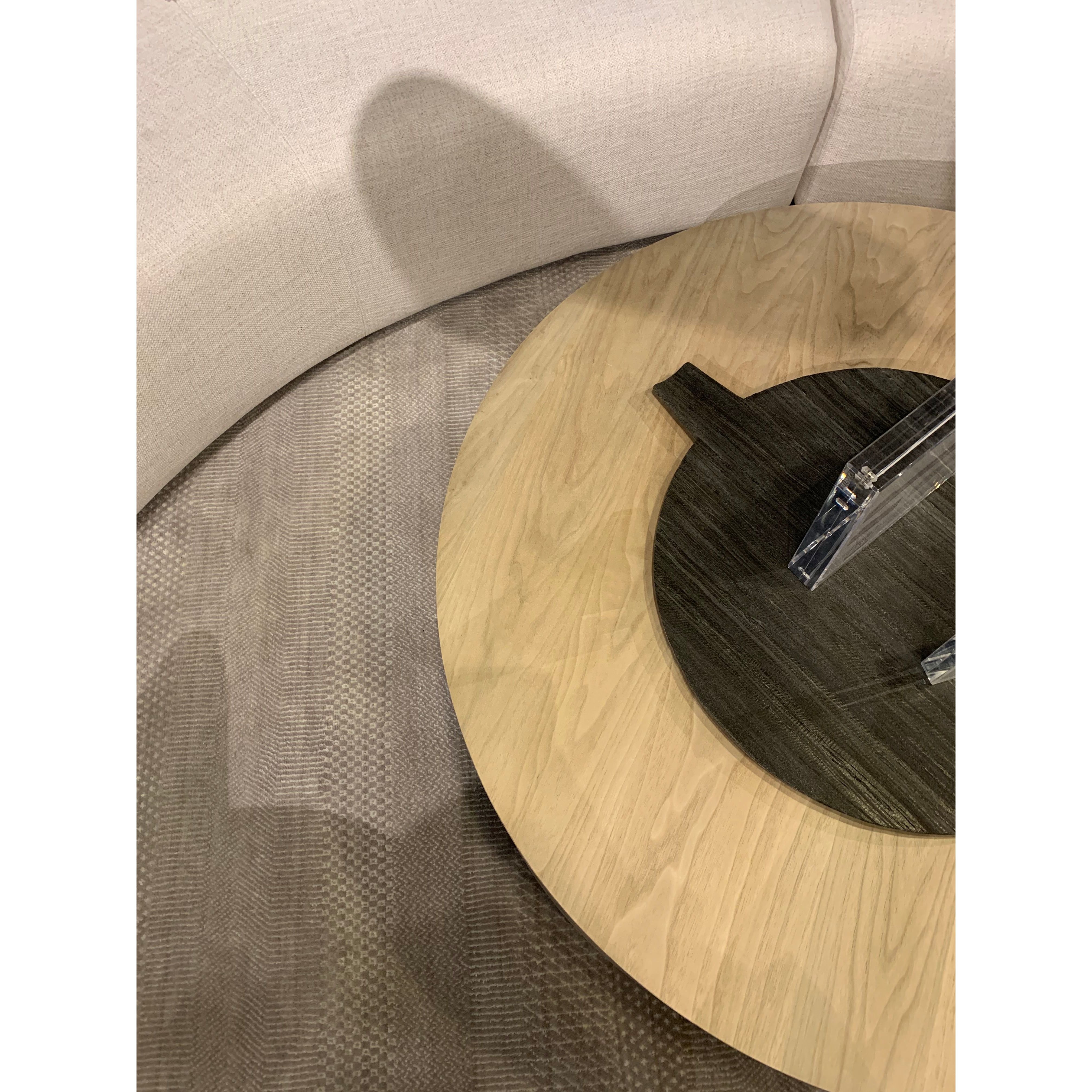 Stunning forces of nature are captured in a walnut-finished coffee table, as spalted primavera and yukas woods are hand-shaped into a cylindrical silhouette. Reflective of woods' natural character, a slight color variance is possible. Amethyst Home provides interior design, new home construction design consulting, vintage area rugs, and lighting in the Nashville metro area.
