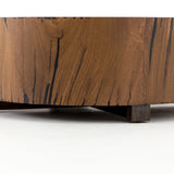 We love how the stunning forces of nature are captured in the Hudson Natural Yukas Coffee Table. Natural yukas wood is hand-shaped into a cylindrical silhouette and placed over a bronzed iron base to complete your living room space.   Overall Dimensions: 40"w x 40"d x 15"h  Colors: Natural Yukas Resin, Gunmetal Materials: Thick Yukas Veneer, Iron