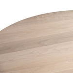 Stunning forces of nature are captured in a walnut-finished coffee table, as spalted primavera and yukas woods are hand-shaped into a cylindrical silhouette. Reflective of woods' natural character, a slight color variance is possible.   Overall Dimensions: 40"w x 40"d x 15"h  Colors: Gunmetal, Ashen Walnut Materials: Iron, Thick Walnut Veneer
