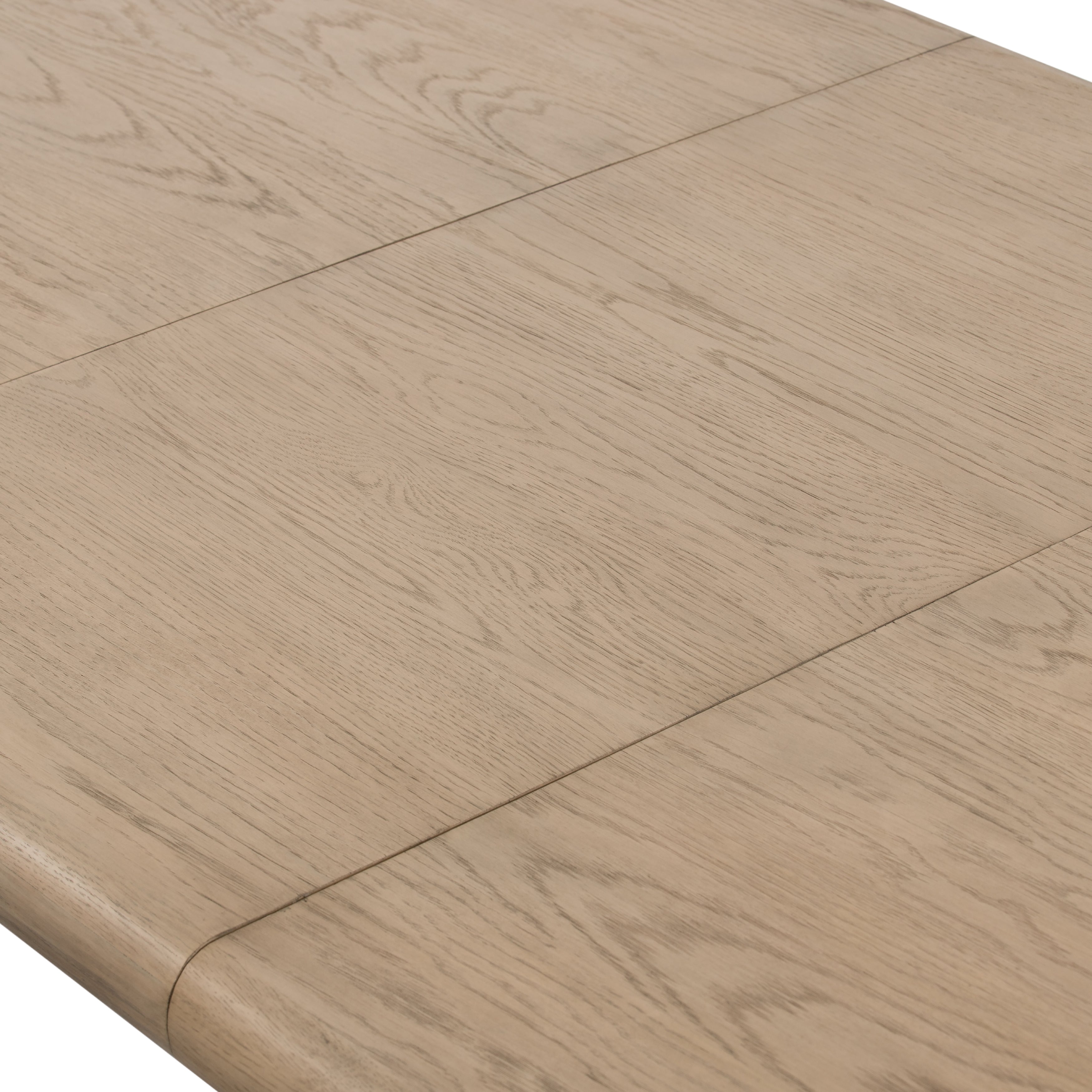The rounded edges of this Jaylen Extension Dining Table - Yucca Oak are so dreamy. Made from solid oak with an oak veneer, this both a kid friendly and beautiful table to add to any dining room or kitchen area! The extension piece allows entertainment perfect for a few friends or the whole family!   Overall Dimensions: 87.00"w x 42.00"d x 30.00"h