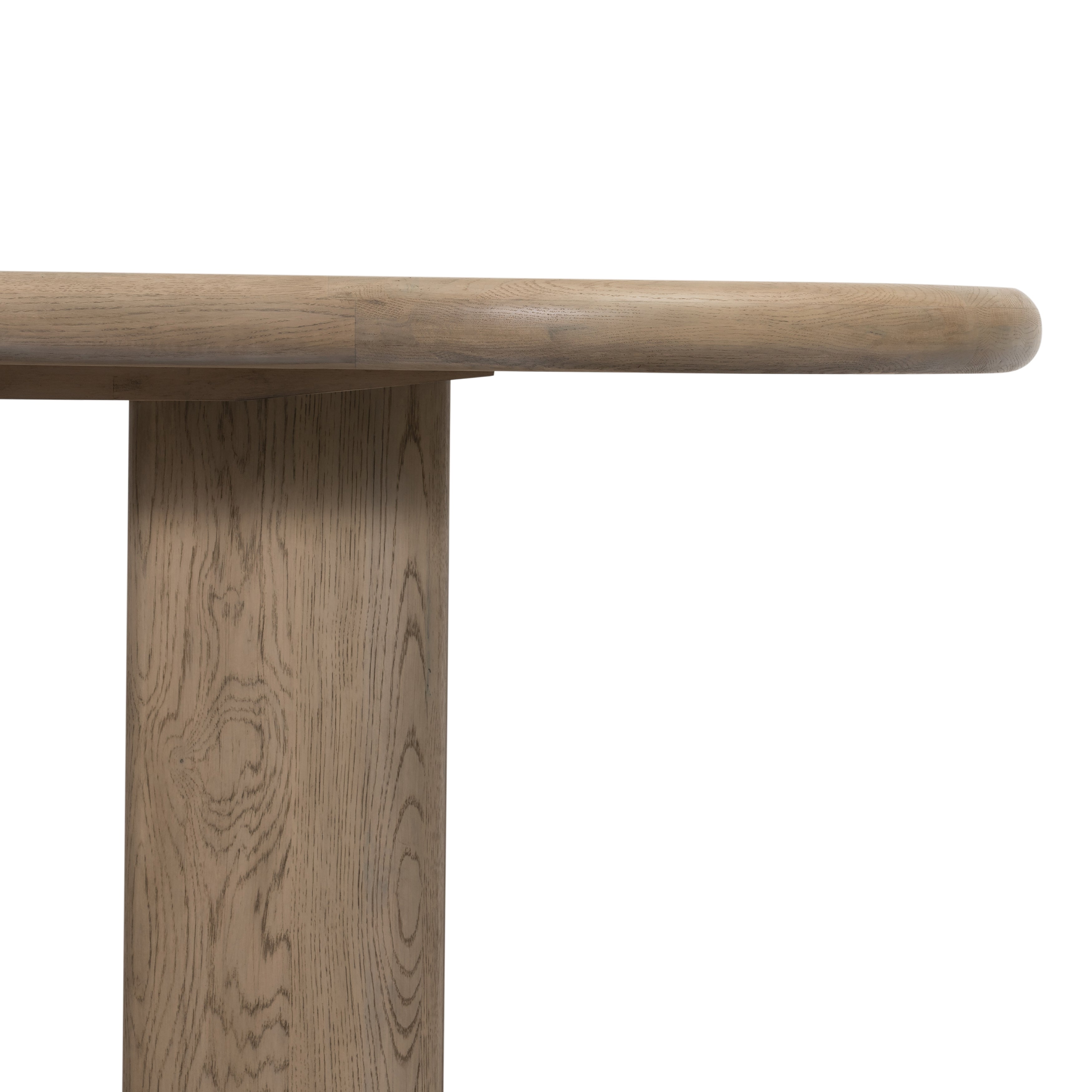 The rounded edges of this Jaylen Extension Dining Table - Yucca Oak are so dreamy. Made from solid oak with an oak veneer, this both a kid friendly and beautiful table to add to any dining room or kitchen area! The extension piece allows entertainment perfect for a few friends or the whole family!   Overall Dimensions: 87.00"w x 42.00"d x 30.00"h