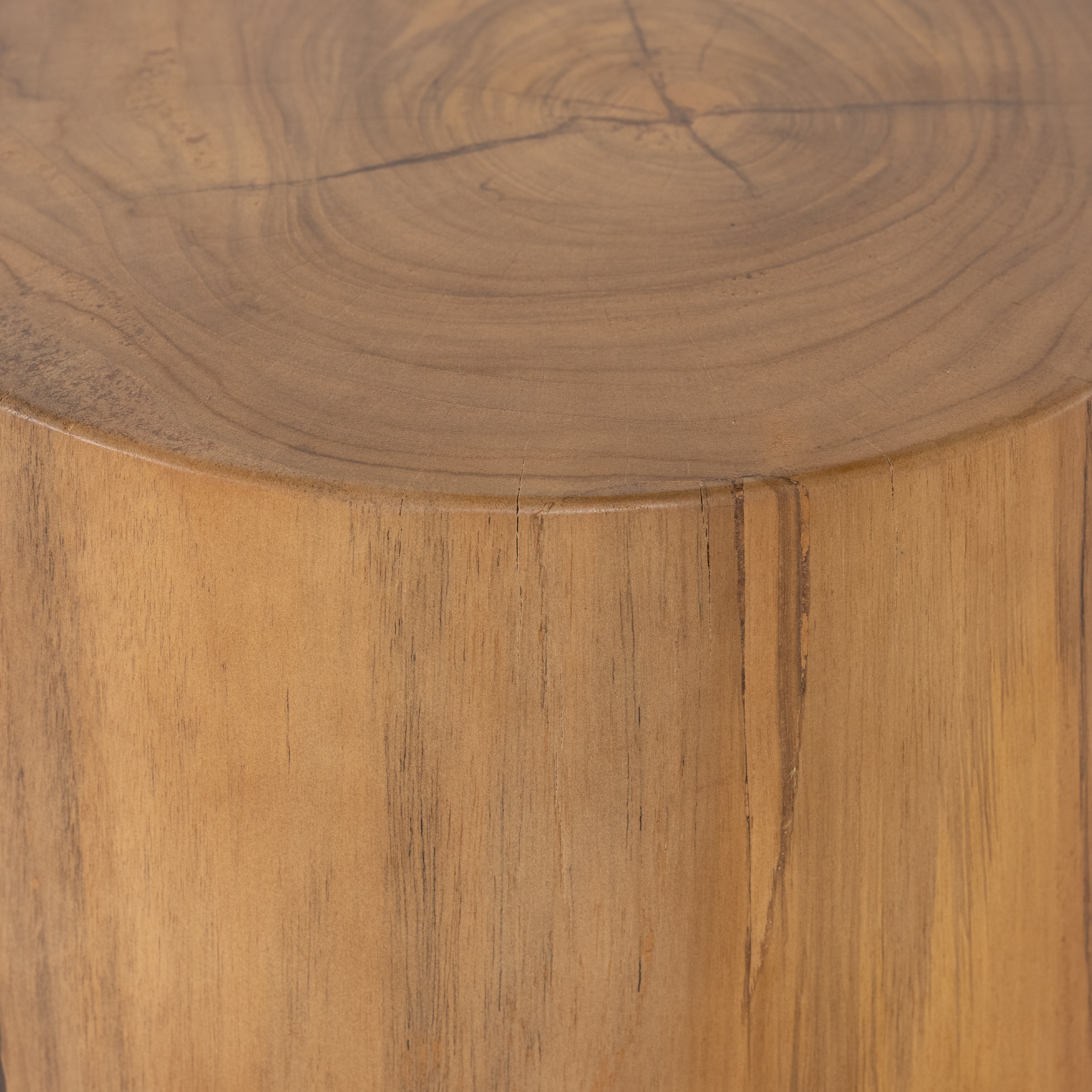 This Jovie Outdoor End Table - Natural Teak is made from solid teak and brings a bright, organic feel to any space.   Amethyst Home celebrates natural materials, which often comes with beautiful imperfections. Each piece is made uniquely for you, please expect some variation and character -- we embrace the design approach of Wabi Sabi  Overall Dimensions: 13.00"w x 13.00"d x 18.00"h