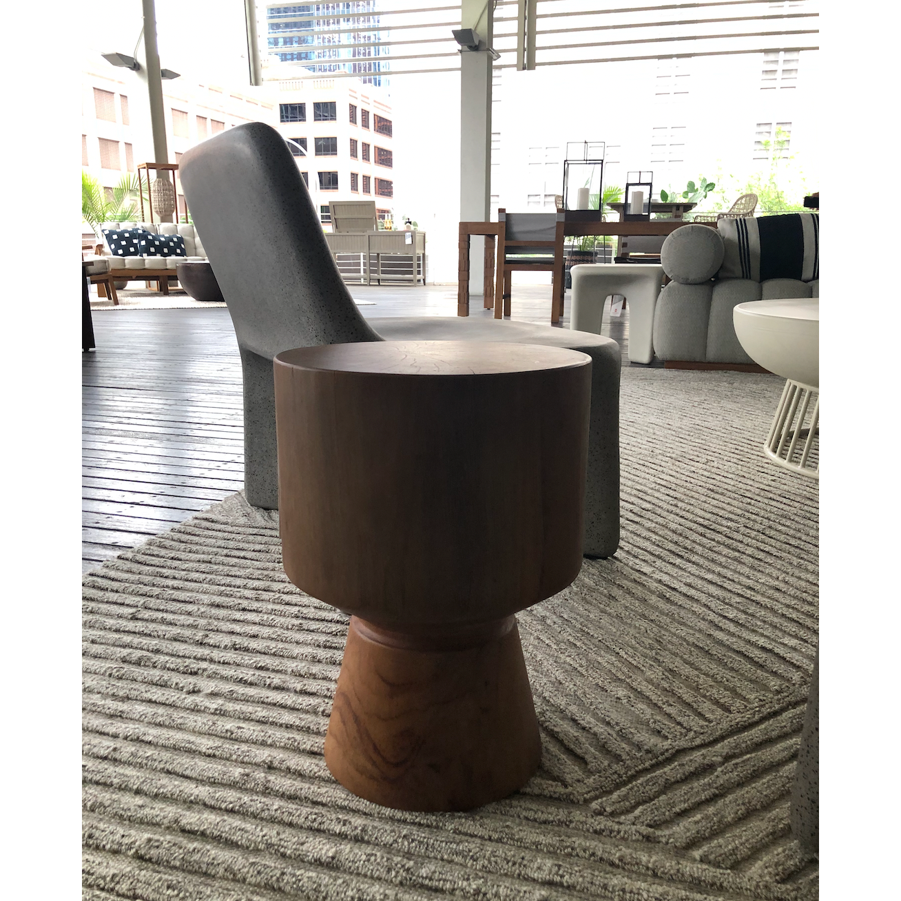 This Jovie Outdoor End Table - Natural Teak is made from solid teak and brings a bright, organic feel to any space.   Amethyst Home celebrates natural materials, which often comes with beautiful imperfections. Each piece is made uniquely for you, please expect some variation and character -- we embrace the design approach of Wabi Sabi  Overall Dimensions: 13.00"w x 13.00"d x 18.00"h