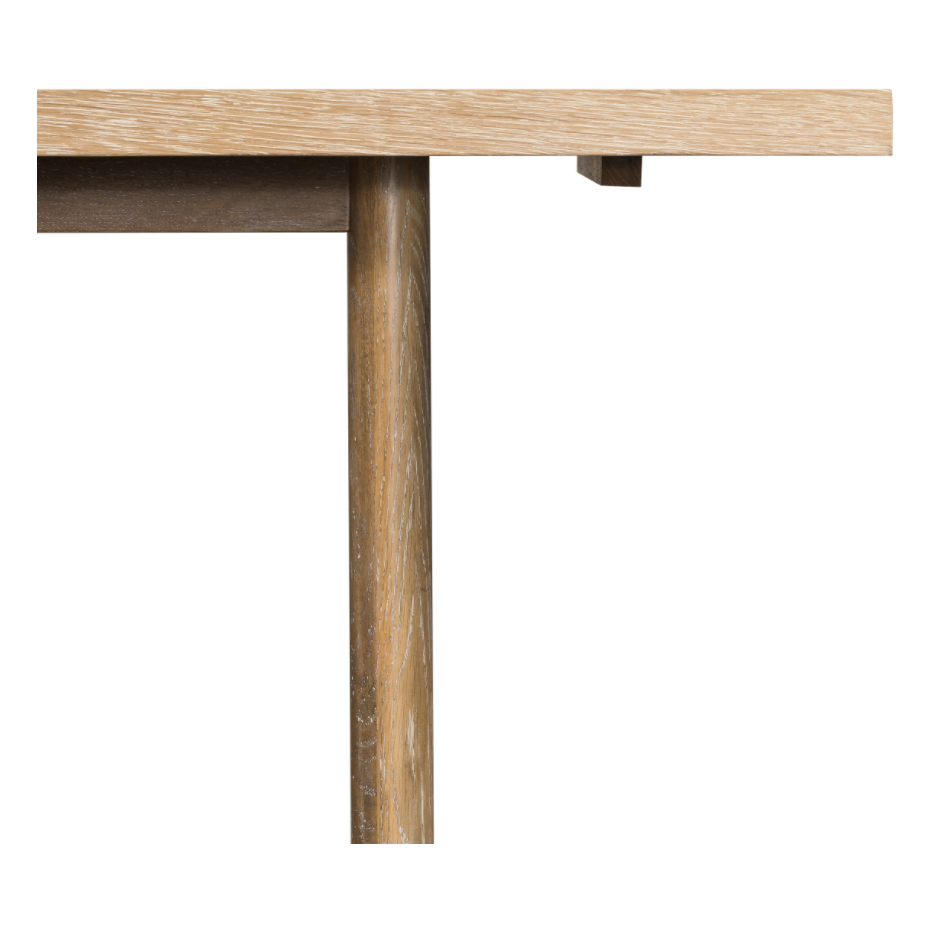 Rustic goes modern with this Mika Dining Table. A triangular stretcher brings architectural interest to this simply styled dining table of white-washed oak.  Overall Dimensions: 84.00"w x 36.00"d x 30.00"h  Colors: Whitewashed Oak Materials: Oak, Oak Veneer