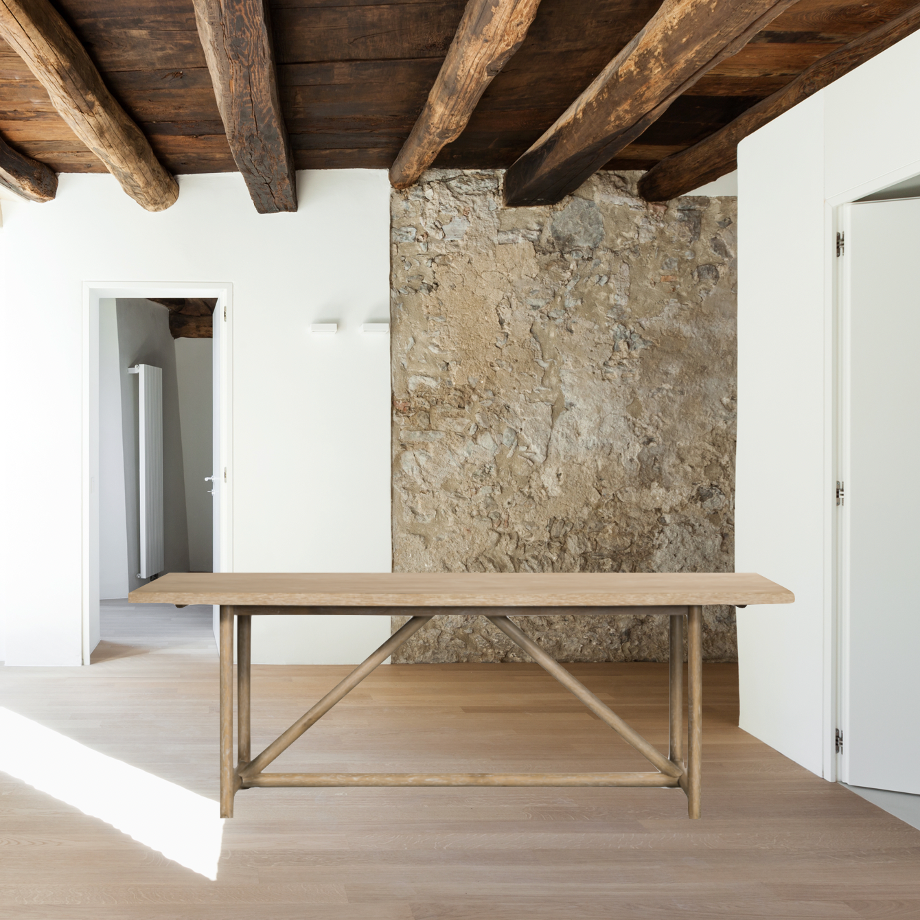Rustic goes modern with this Mika Dining Table. A triangular stretcher brings architectural interest to this simply styled dining table of white-washed oak.  Overall Dimensions: 84.00"w x 36.00"d x 30.00"h  Colors: Whitewashed Oak Materials: Oak, Oak Veneer