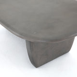 Featuring Naya Outdoor Coffee Table by Four Hands at Amethyst Home. This Naya Outdoor Coffee Table is modern and curve-driven. Dark grey concrete forms a rounded rectangle top with bullnose edging, reminiscent of a shapely surfboard.  Cover or store inside during inclement weather.
Overall Dimensions: 46"W x 28"L x 16"HColors: Dark GreyMaterials: ConcreteWeig.  Amethyst Home provides interior design, new home construction design consulting, vintage area rugs, and lighting in the Dallas metro area.