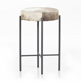 The Nocona Speckled Hide Bar and Counter stool is modern minimalist to a T. Slim and airy, gunmetal-finished iron legs form a cradle-style frame for speckled hide seating, perfectly sized for the counter or bar. Each hide will be unique and will vary. Amethyst Home provides interior design, new home construction design consulting, vintage area rugs, and lighting in the Los Angeles metro area.