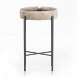 The Nocona Speckled Hide Bar and Counter stool is modern minimalist to a T. Slim and airy, gunmetal-finished iron legs form a cradle-style frame for speckled hide seating, perfectly sized for the counter or bar. Each hide will be unique and will vary. Amethyst Home provides interior design, new home construction design consulting, vintage area rugs, and lighting in the Kansas City metro area.
