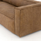 Featuring Nolita Reverse Stitch Sofa - Natural Washed Sand by Four Hands at Amethyst Home. Sophisticated Italian styling with distinctly casual appeal is found in this Nolita Reverse Stitch Sofa - Natural Washed Sand. Top-grain leather takes on a natural sand color with contrast stitching along the welt, sure to elevate the space for any living room. 
Ov.  Amethyst Home provides interior design, new home construction design consulting, vintage area rugs, and lighting in the Los Angeles metro area.