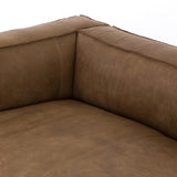 Featuring Nolita Reverse Stitch Sofa - Natural Washed Sand by Four Hands at Amethyst Home. Sophisticated Italian styling with distinctly casual appeal is found in this Nolita Reverse Stitch Sofa - Natural Washed Sand. Top-grain leather takes on a natural sand color with contrast stitching along the welt, sure to elevate the space for any living room. 
Ove.  Amethyst Home provides interior design, new home construction design consulting, vintage area rugs, and lighting in the Alpharetta metro area.