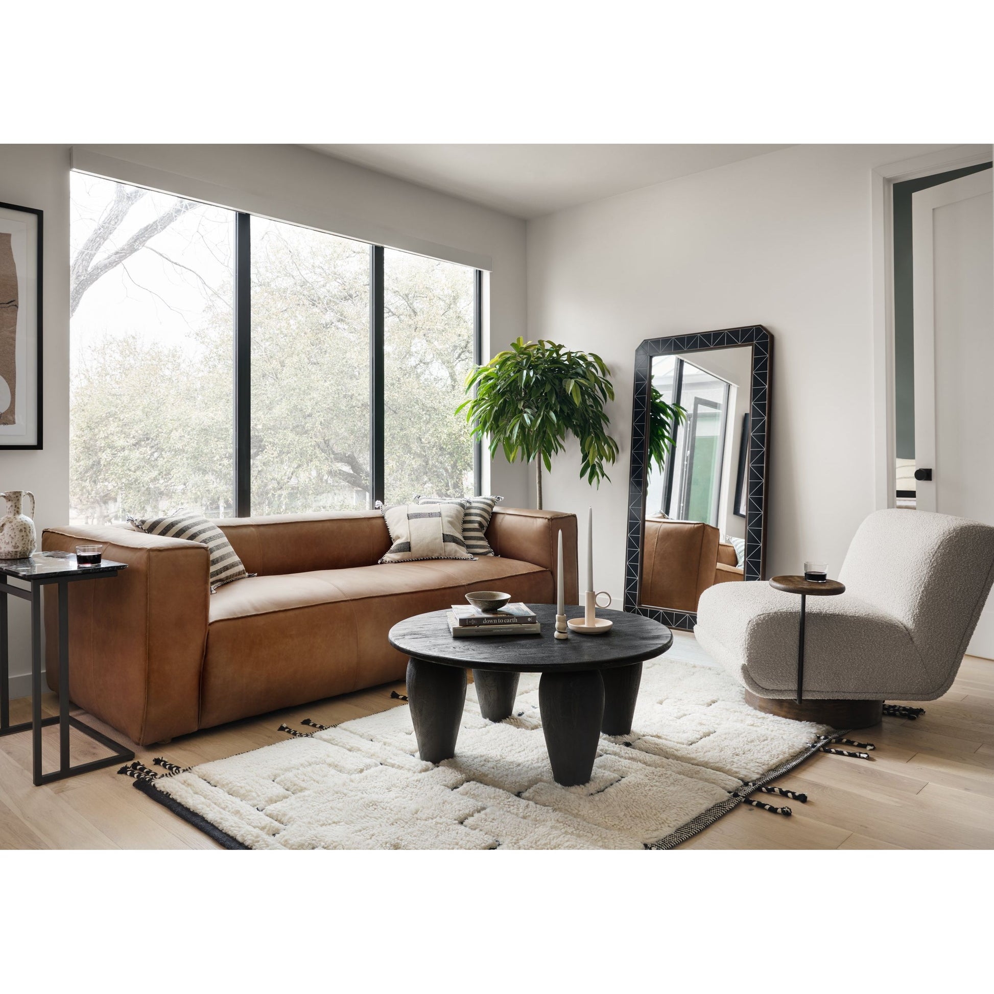 Sophisticated Italian styling with distinctly casual appeal is found in this Nolita Reverse Stitch Sofa - Natural Washed Sand. Top-grain leather takes on a natural sand color with contrast stitching along the welt, sure to elevate the space for any living room.   Overall Dimensions: 99.25"w x 43.00"d x 28.75"h
