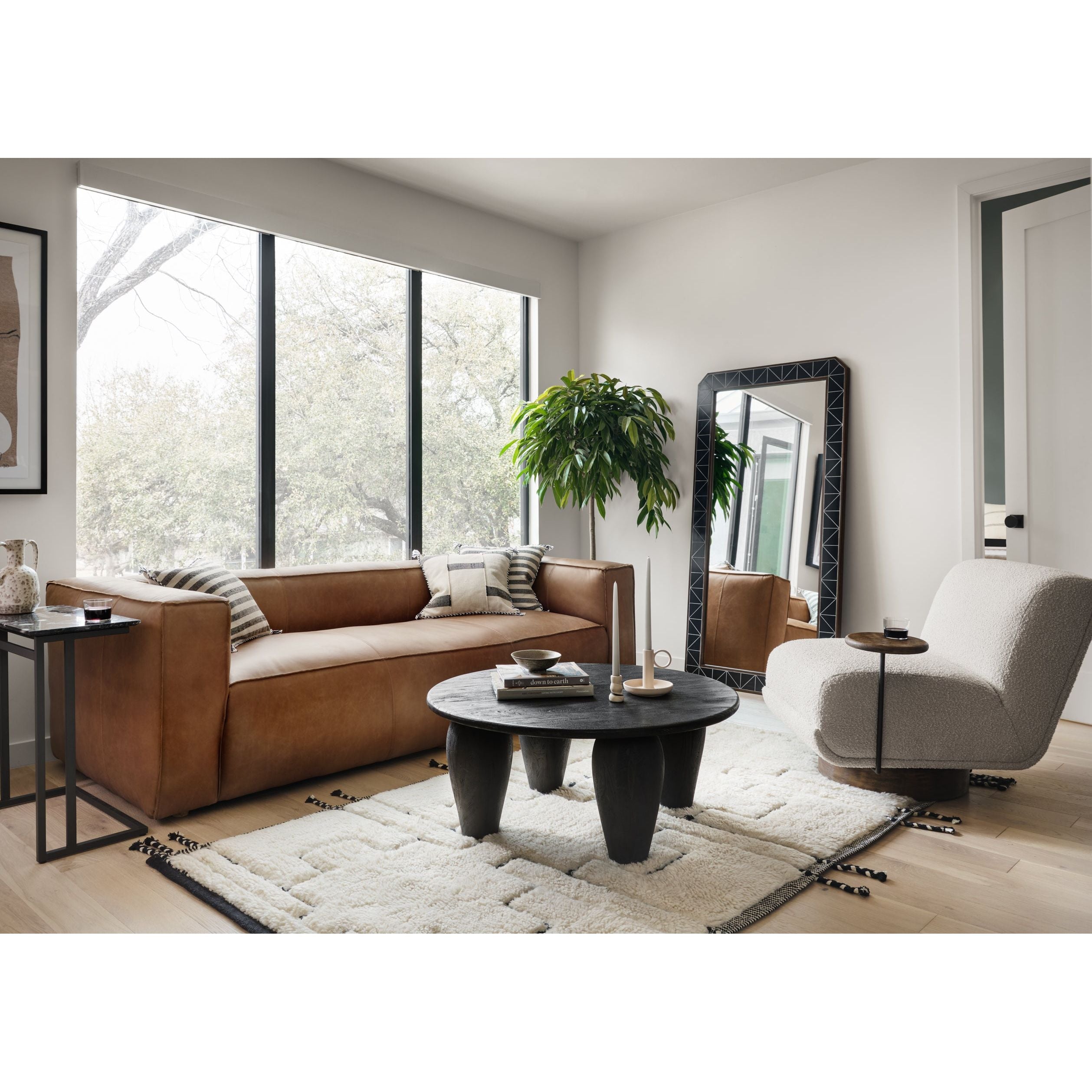 Sophisticated Italian styling with distinctly casual appeal is found in this Nolita Reverse Stitch Sofa - Natural Washed Sand. Top-grain leather takes on a natural sand color with contrast stitching along the welt, sure to elevate the space for any living room.   Overall Dimensions: 99.25"w x 43.00"d x 28.75"h