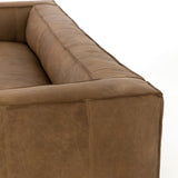 Featuring Nolita Reverse Stitch Sofa - Natural Washed Sand by Four Hands at Amethyst Home. Sophisticated Italian styling with distinctly casual appeal is found in this Nolita Reverse Stitch Sofa - Natural Washed Sand. Top-grain leather takes on a natural sand color with contrast stitching along the welt, sure to elevate the space for any living room. 
Overall .  Amethyst Home provides interior design, new home construction design consulting, vintage area rugs, and lighting in the Tampa metro area.