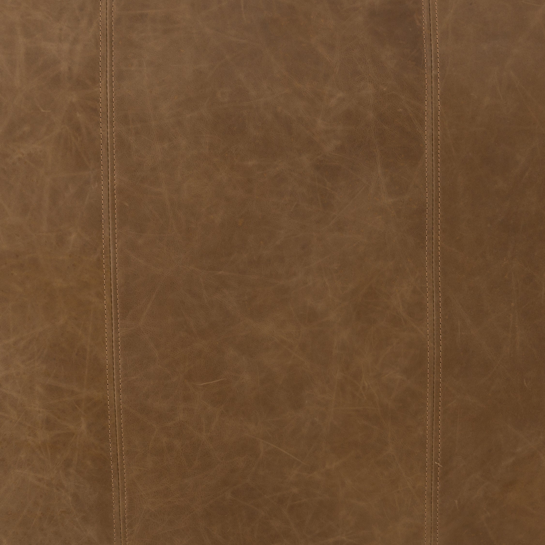 Sophisticated Italian styling with distinctly casual appeal is found in this Nolita Reverse Stitch Sofa - Natural Washed Sand. Top-grain leather takes on a natural sand color with contrast stitching along the welt, sure to elevate the space for any living room.   Overall Dimensions: 99.25"w x 43.00"d x 28.75"h