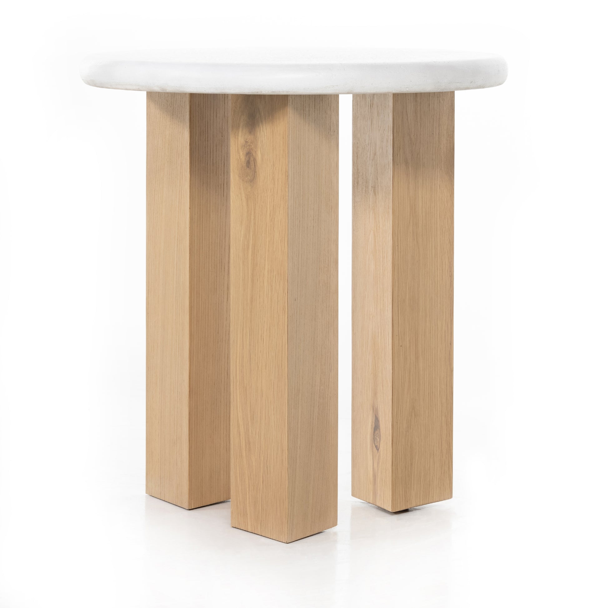 This Odin Nightstand - Stucco White is crisp, clean and beautifully simple. Light-finished oak forms a three-leg frame for a rounded tabletop of white-finished faux concrete.  Overall Dimensions: 22.00"w x 22.00"d x 24.00"h
