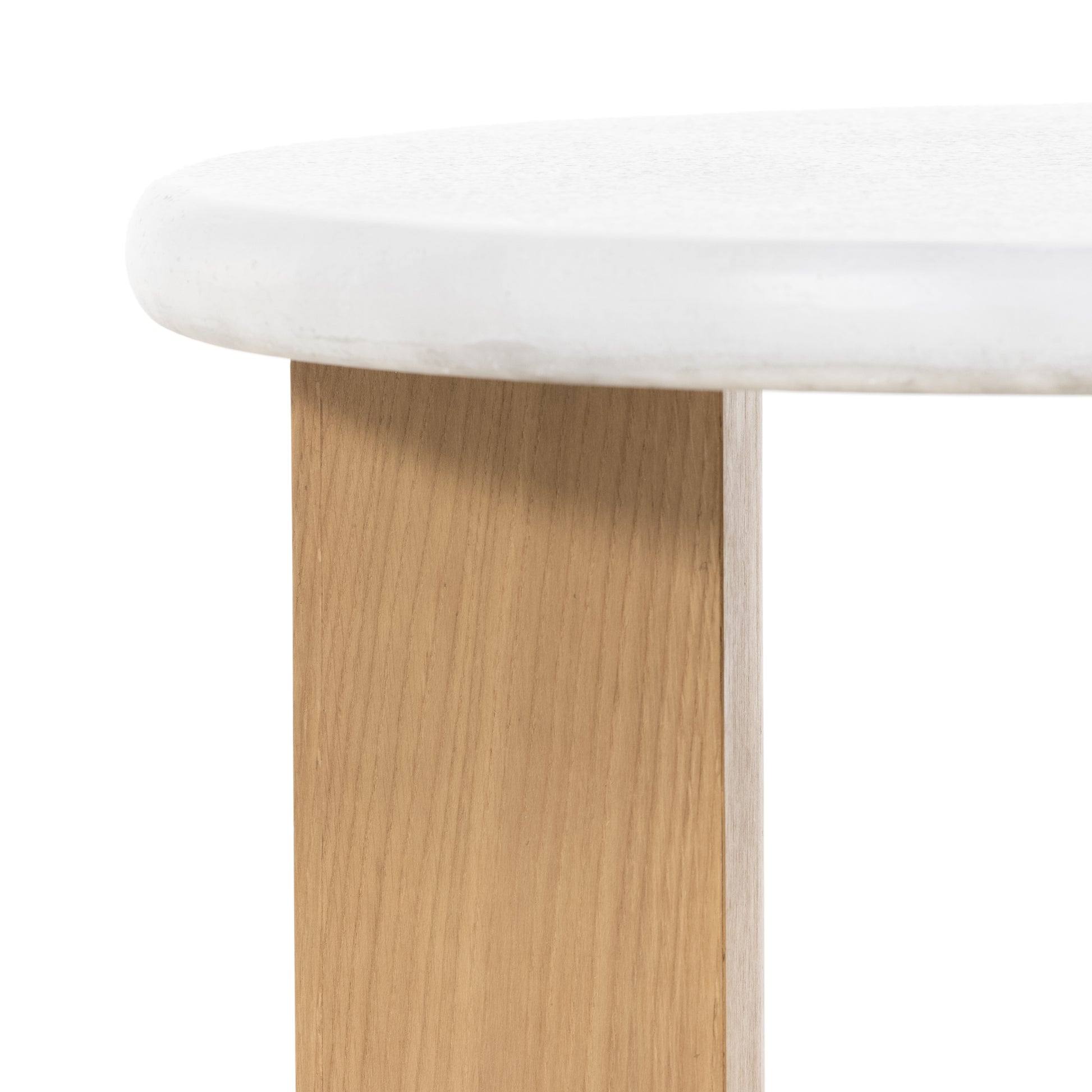 This Odin Nightstand - Stucco White is crisp, clean and beautifully simple. Light-finished oak forms a three-leg frame for a rounded tabletop of white-finished faux concrete.  Overall Dimensions: 22.00"w x 22.00"d x 24.00"h